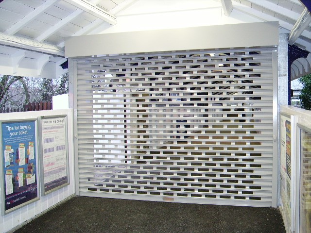 picture of white industrial door at a train station